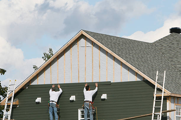 Professional Siding Contractor technician working in Westover, WV